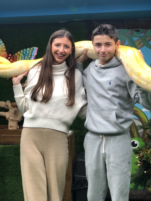 Harry and his sister Abbie, Harry the child who is suffers from autism and sensory processing disorder with the animals at the zoo.