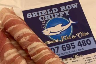 The sausage wrapped in bacon. giant battered pigs