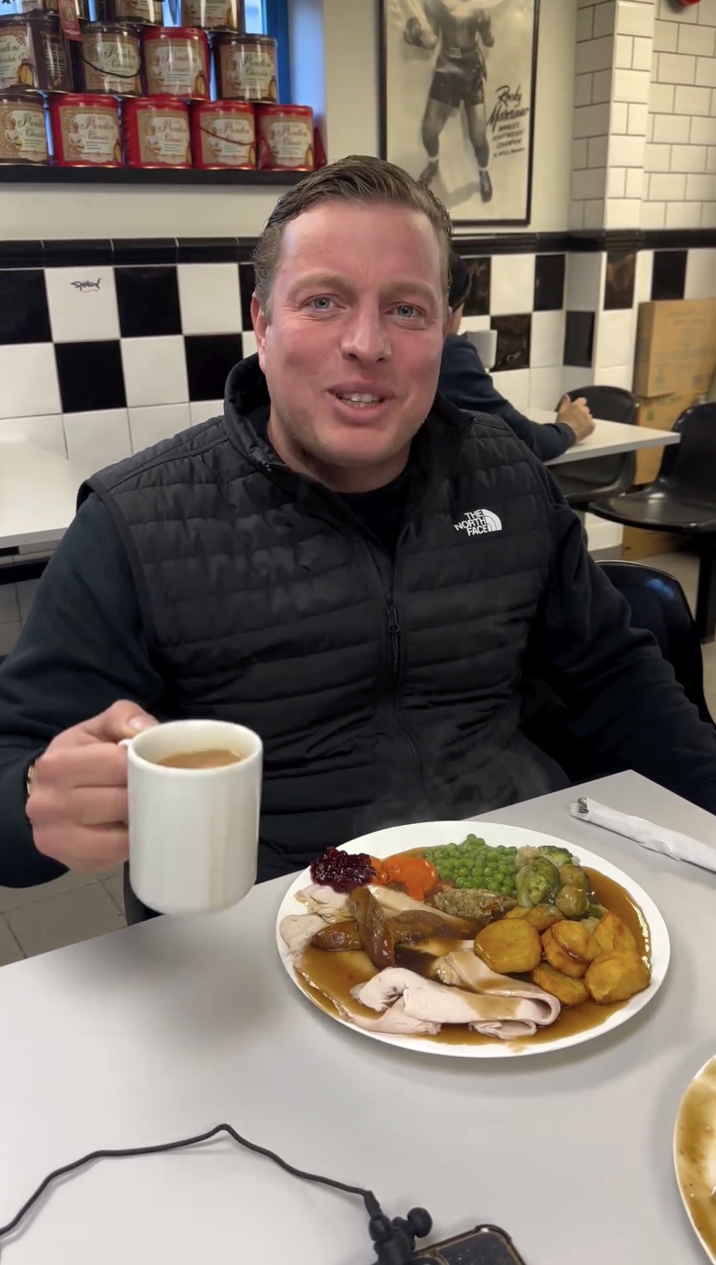 Video grab of Thomas Skinner having a Dino’s roast dinner for breakfast.