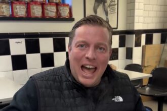 Video grab of Thomas Skinner having a Dino’s roast dinner for breakfast.