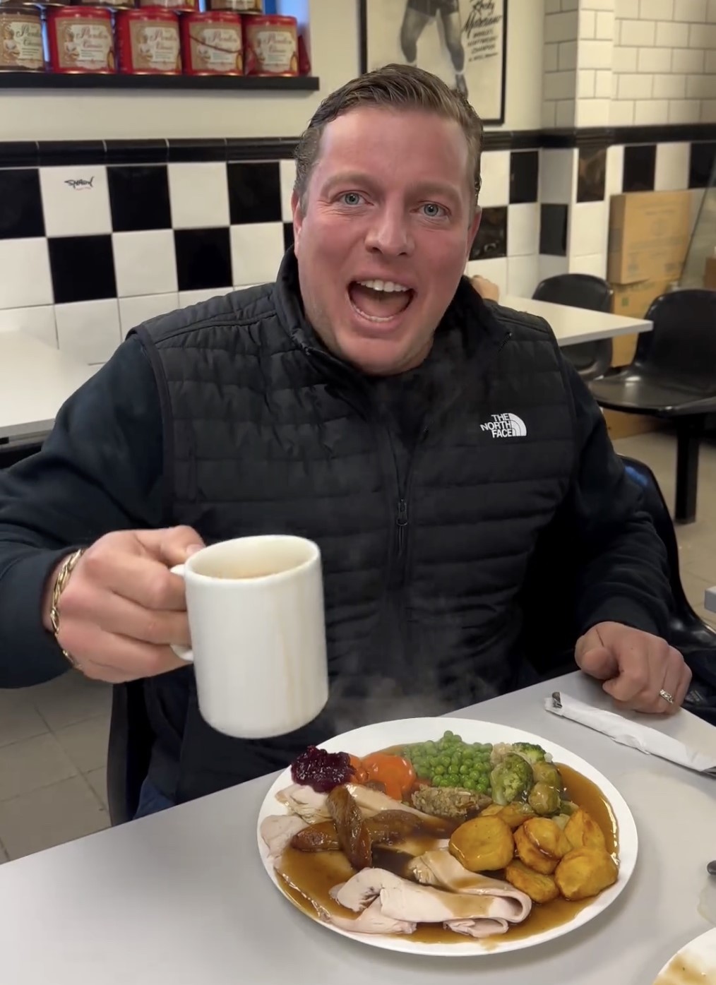 Video grab of Thomas Skinner having a Dino’s roast dinner for breakfast.