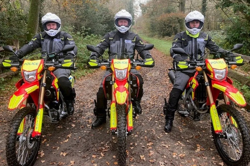 The police force riding their new dirt bikes.