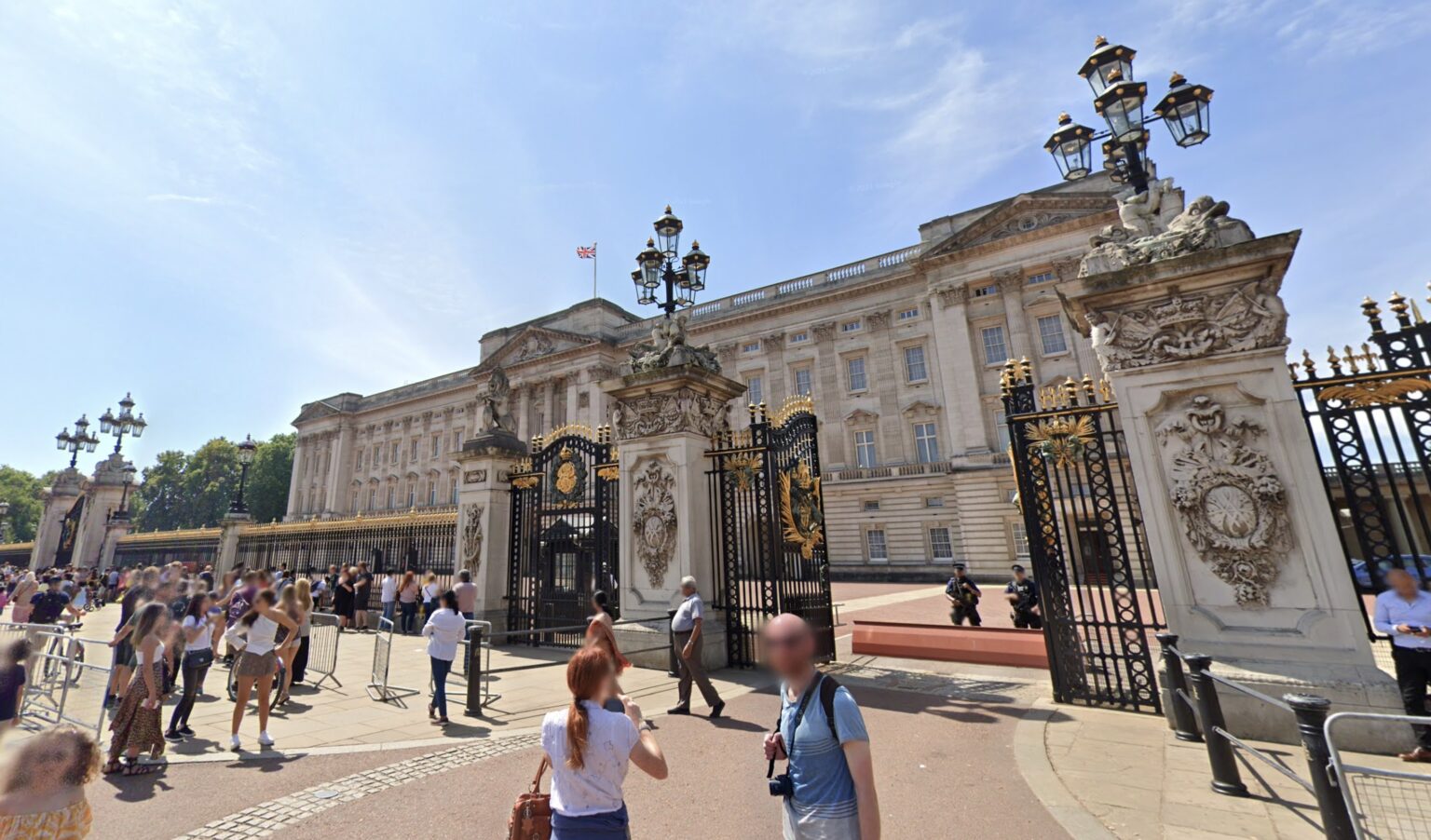 Outside Buckingham Palace, where King Charles hiring a royal phone operator.