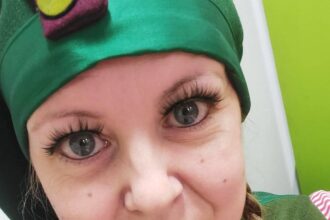 Lisa Tomlinson-Cowie the nursing associate who turns into a ‘real-life’ elf during the holiday season.