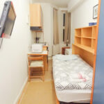The flat available for rent with very limited space. This shows the narrow studio apartment.