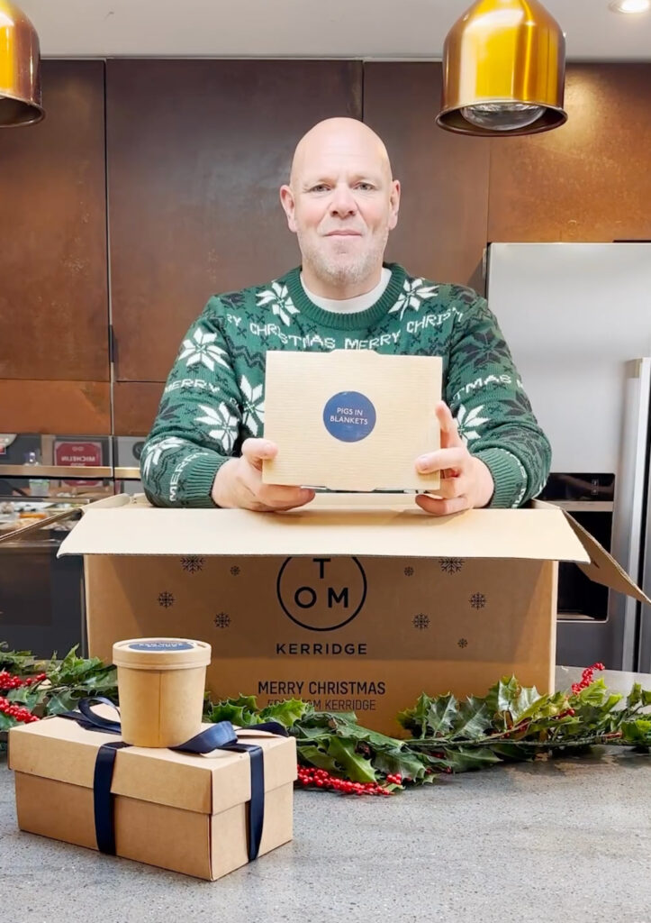 Tom Kerridge showing Christmas dinner Box, after increasing the prices of dishes at new London restaurant.