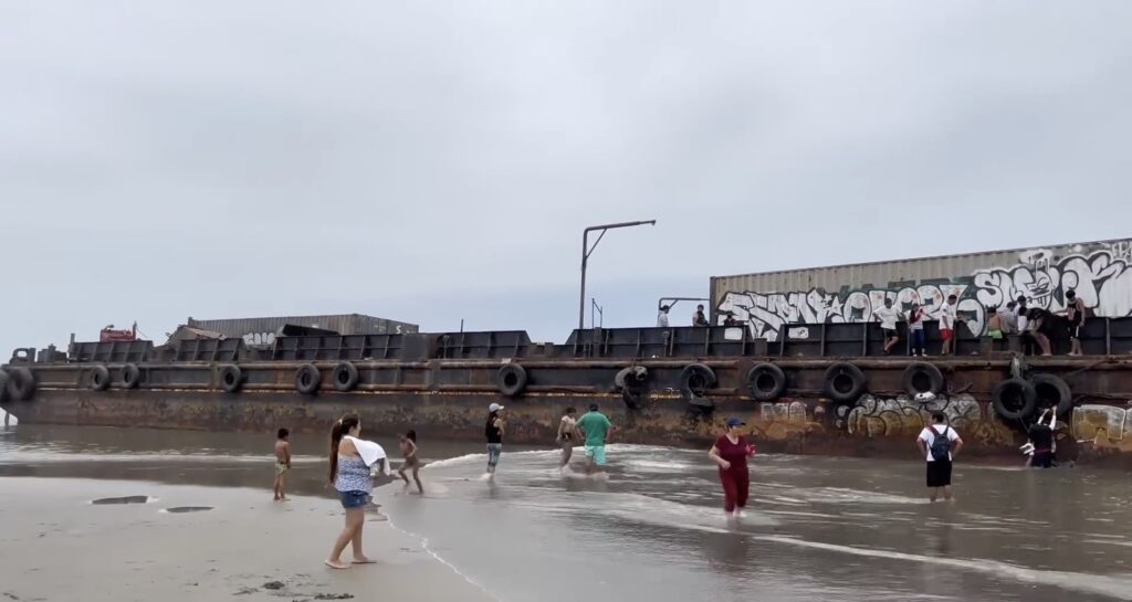 Two ‘ghost ships’ wash up on tourist beach.