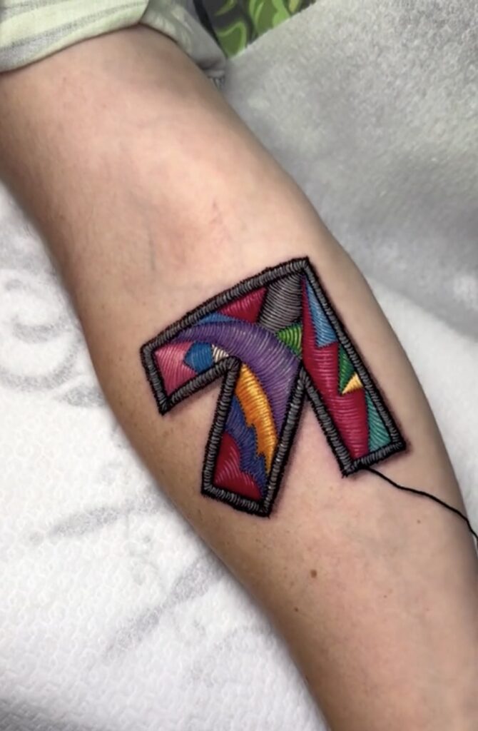 one of Cristina’s hyper realistic embroidery tattoos.