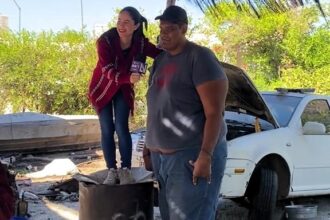 Video grab - Leonel Campas at his work place giant mechanic who is 7’5" tall goes viral.