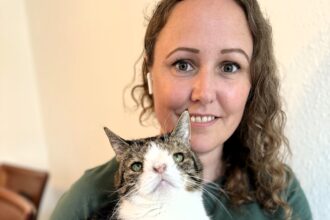 Fenjah Mogensen and Monty the deaf cat Suffering from a chromosome abnormality.