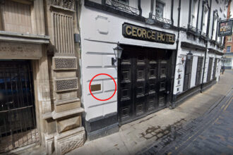UK’s smallest glazed window at The George Hotel in Hull, East Yorkshire has become a tourist sensation.