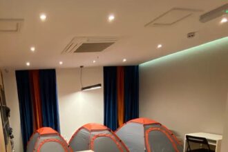 tents inside the bizarre studio flat in london, available for renting.