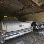 Inside the abandoned property discovered by Urban explorer with vintage cars parked in the garage and driveway.