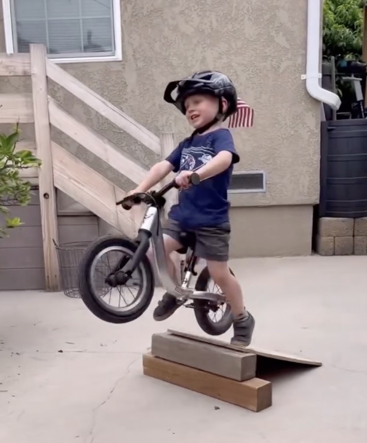 A video grab of 4-year-old Elliot Honeycutt sensation bike stunt goes viral.