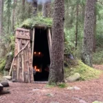 Outside the basic traditional wood and mud huts at the Kolarybn Eco Lodge located in the forests of Sweden are available for renting.