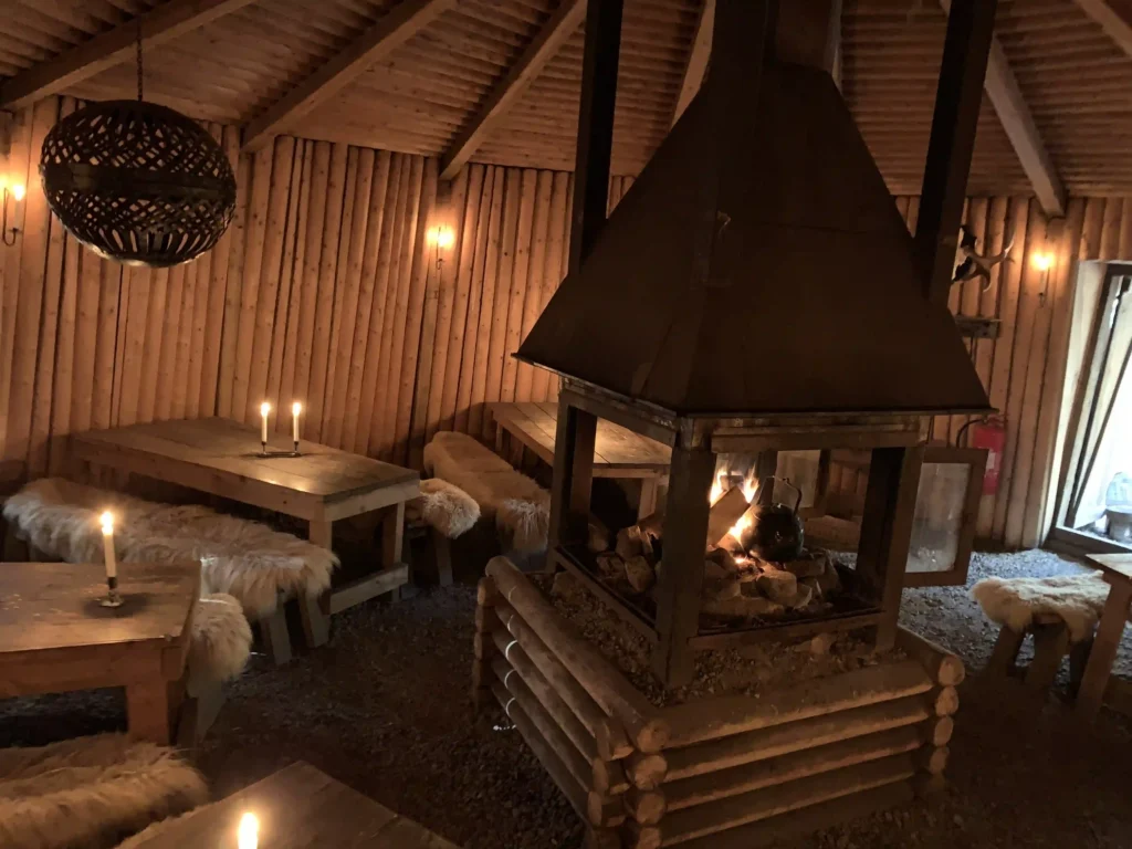 inside the basic traditional wood and mud huts at the Kolarybn Eco Lodge located in the forests of Sweden are available for renting.