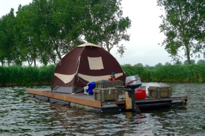 Experience a unique stay on a self-made raft in the Netherlands for £64 a night. Enjoy tranquility and the thrill of being your own captain on the water.