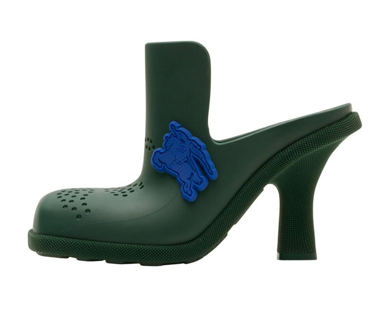 Burberry's £690 rubber high-heeled mules, resembling gardening shoes, spark mockery. Exclusive to Harrods, these Italy-made mules feature a 3.5-inch rubber heel and quilted leather lining. However, critics liken them to Crocs charms and question their style and hefty price tag.