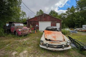 the rundown property, priced available for sale in Canaan, New Hampshire, US, includes over 300 classic cars, perfect for car enthusiasts looking for a project.