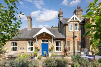 outside of the converted railway station property available for sale in the village of Coltishall, near Norwich.