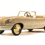 Pedal-powered half-size E-Type Jaguar bedazzled with 100,000 Swarovski crystals and gold plating up for auction at RM Sotheby’s in Dubai.