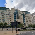 MI6’s HQ in Vauxhall, south London is hiring James Bond wannabes for £50k/year. Café meetings, global travel, and office work part of Intel Officer role. Graduates with 2:2 degree or higher eligible. Training provided. Apply now!