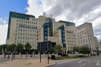 MI6’s HQ in Vauxhall, south London is hiring James Bond wannabes for £50k/year. Café meetings, global travel, and office work part of Intel Officer role. Graduates with 2:2 degree or higher eligible. Training provided. Apply now!