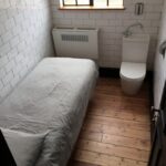 London's tiniest Airbnb stirs mixed reactions, likened to a prison cell but praised for cleanliness and location, offering budget-conscious travelers a compact stay now available for renting.