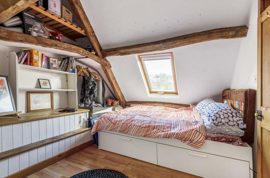 An ordinary-looking terraced house hides a unique surprise—a built-in ship—now on sale in Nailsworth, Gloucestershire.