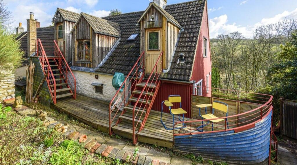 An ordinary-looking terraced house hides a unique surprise—a built-in ship—now on sale in Nailsworth, Gloucestershire.