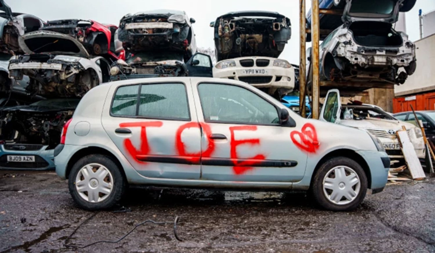 Turn Valentine's Day heartbreak into closure by dedicating a car to your ex, with their name spray-painted on it before it's crushed.