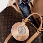 Louis Vuitton gets mocked online for selling expensive SPEAKER that clips onto handbag.