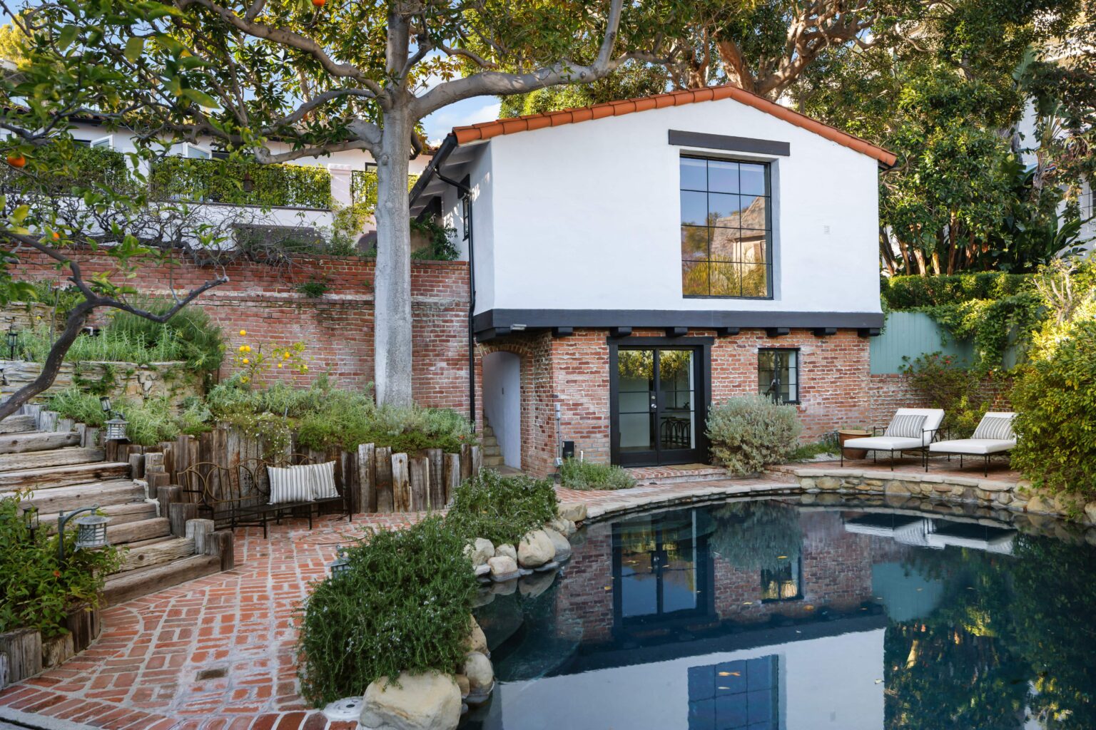 Queen drummer Roger Taylor lists his meticulously restored Spanish-style mansion in central Los Angeles for $6 million. The 1933 home boasts 4 bedrooms, 5 bathrooms, and lush outdoor amenities, offering a serene retreat in bustling LA.