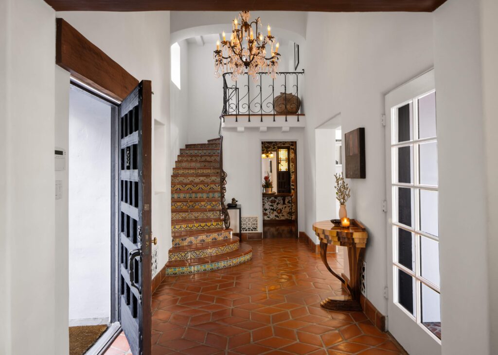 Queen drummer Roger Taylor lists his meticulously restored Spanish-style mansion in central Los Angeles for $6 million. The 1933 home boasts 4 bedrooms, 5 bathrooms, and lush outdoor amenities, offering a serene retreat in bustling LA.