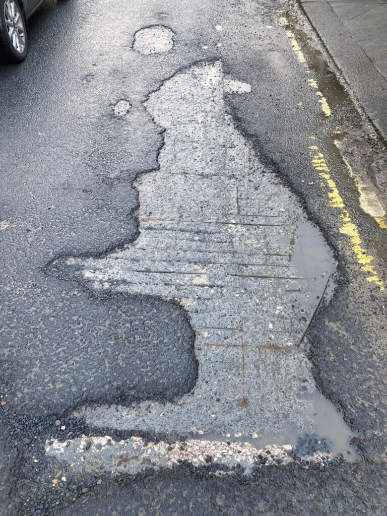 The massive pothole resembling the shape of the United Kingdom, complete with protruding parts like Cornwall and Wales, leaves locals frustrated in Burnley.