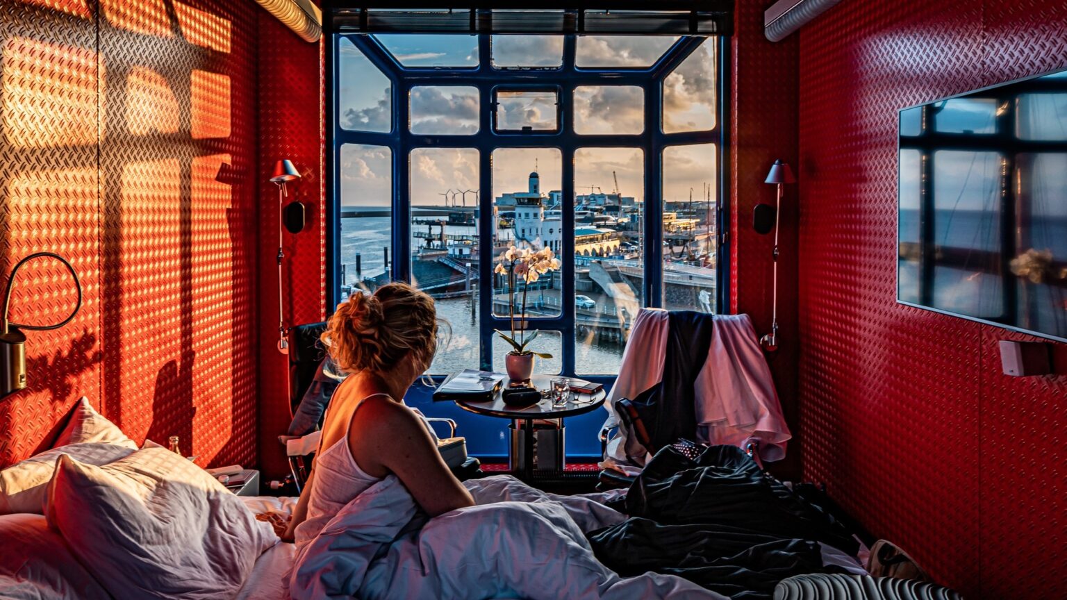 unique stay in the 'Havenkraan van Harlingen' crane in The Netherlands, offering panoramic sea views and luxurious amenities.