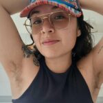 Aria Loca proudly flaunts her hairy legs despite public stares, asserting women don't need to conform to societal beauty standards. While her dating life faced challenges, she finds support online for her natural look.