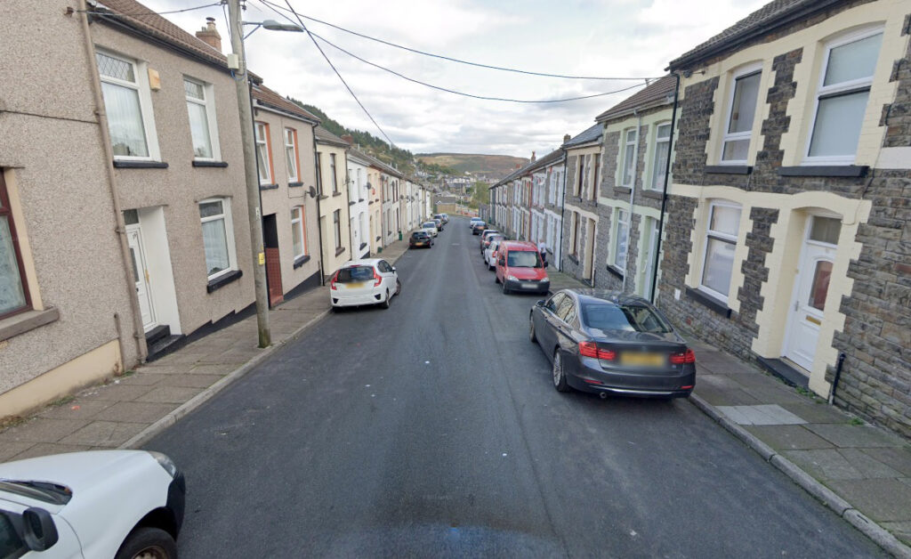 The High Street in Tonypandy where the two bedroom property in Wales which has a staring bid of £1 and no reserve.