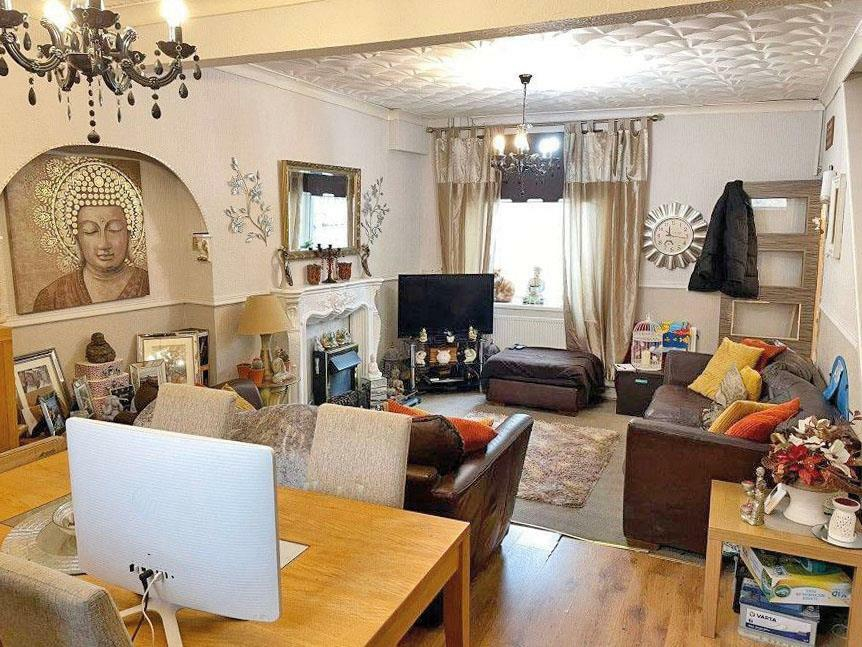 inside the modern two-bedroom house in Tonypandy, Wales available at an auction for a bargain.