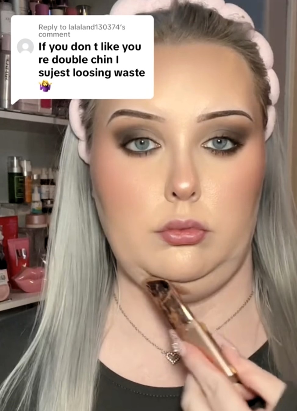 Courtney Worsham goes viral for sharing her makeup hack to conceal her double chin, prompting debate online. While some criticize, others praise her confidence-boosting trick. Courtney defends her choice, citing rapid weight gain from medication and finding empowerment through makeup.