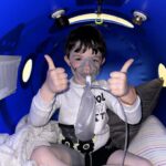 Discover how a unique "submarine" tank therapy is transforming the life of an autistic boy, offering hope and progress for his development.