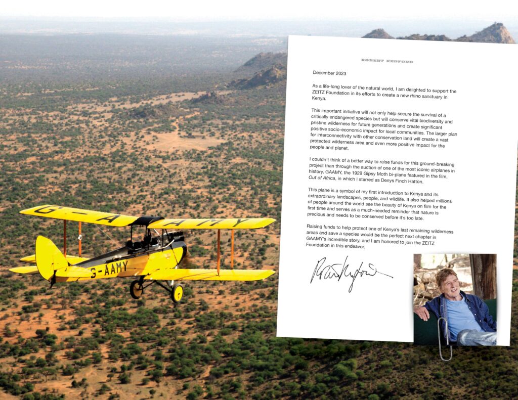 A vintage biplane from the movie "Out of Africa" sells for £416,000, soaring past its expected price. All proceeds support a new rhino sanctuary in Kenya.