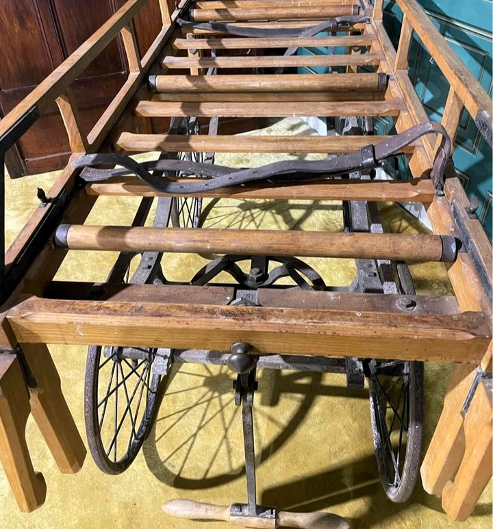 Victorian-era 'funeral cart' listed on Facebook Marketplace for £1,400. Once used for those unable to afford horse-drawn carriages, it's now a unique antique with fold-down wooden sides. Seller describes it as "one of the strangest things" they've sold.