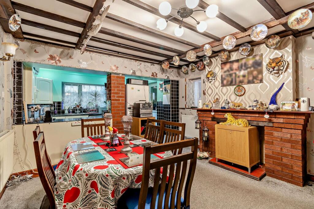 For £189,000, a three-bedroom house in Wednesbury boasts a unique tiger-themed interior, featuring prints, ornaments, and even duvets, adding a quirky touch to the property.