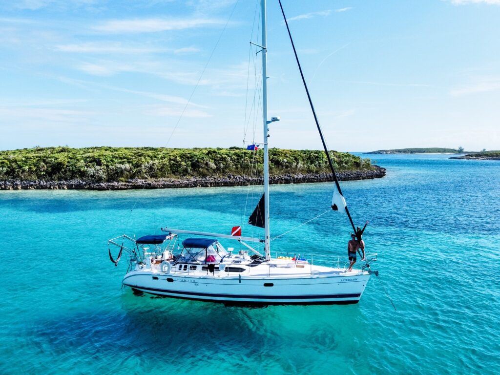 Emma and Andrew share their experience of living on a sailboat, highlighting both the challenges and savings compared to traditional housing. While adjustments like limited showers and power are necessary, they find fulfillment in the unique lifestyle and plan to continue sailing for the foreseeable future.