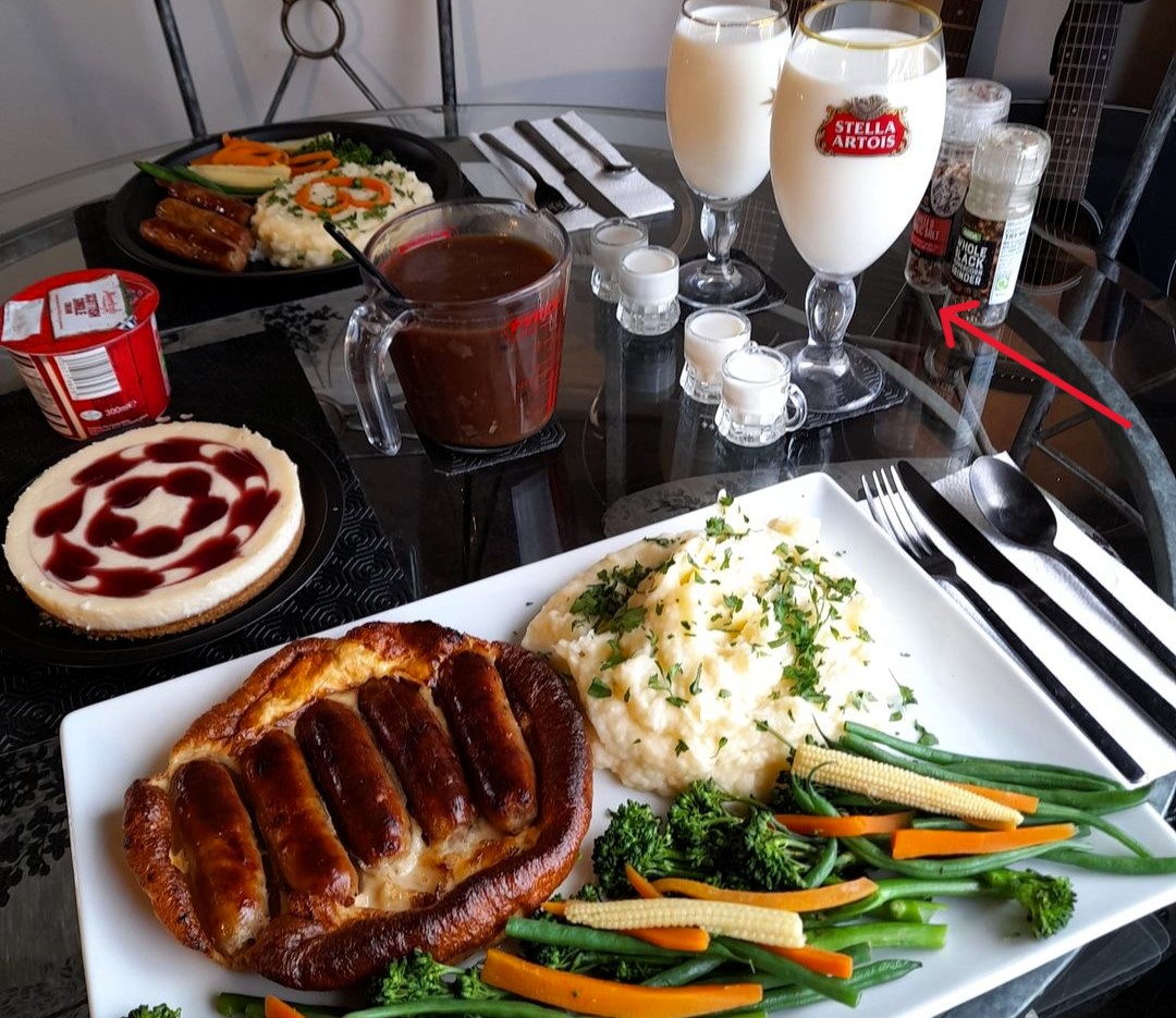 A couple's posh meal draws attention as they sip milk from Stella Artois glasses, sparking debate over drink choice. Viral sensation with 1,000+ comments.