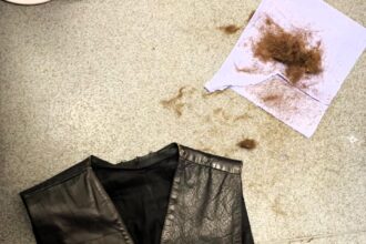Depop shopper finds waistcoat filled with hair, seller clueless. Exchange sparks humor online as buyer questions jacket's unusual contents.