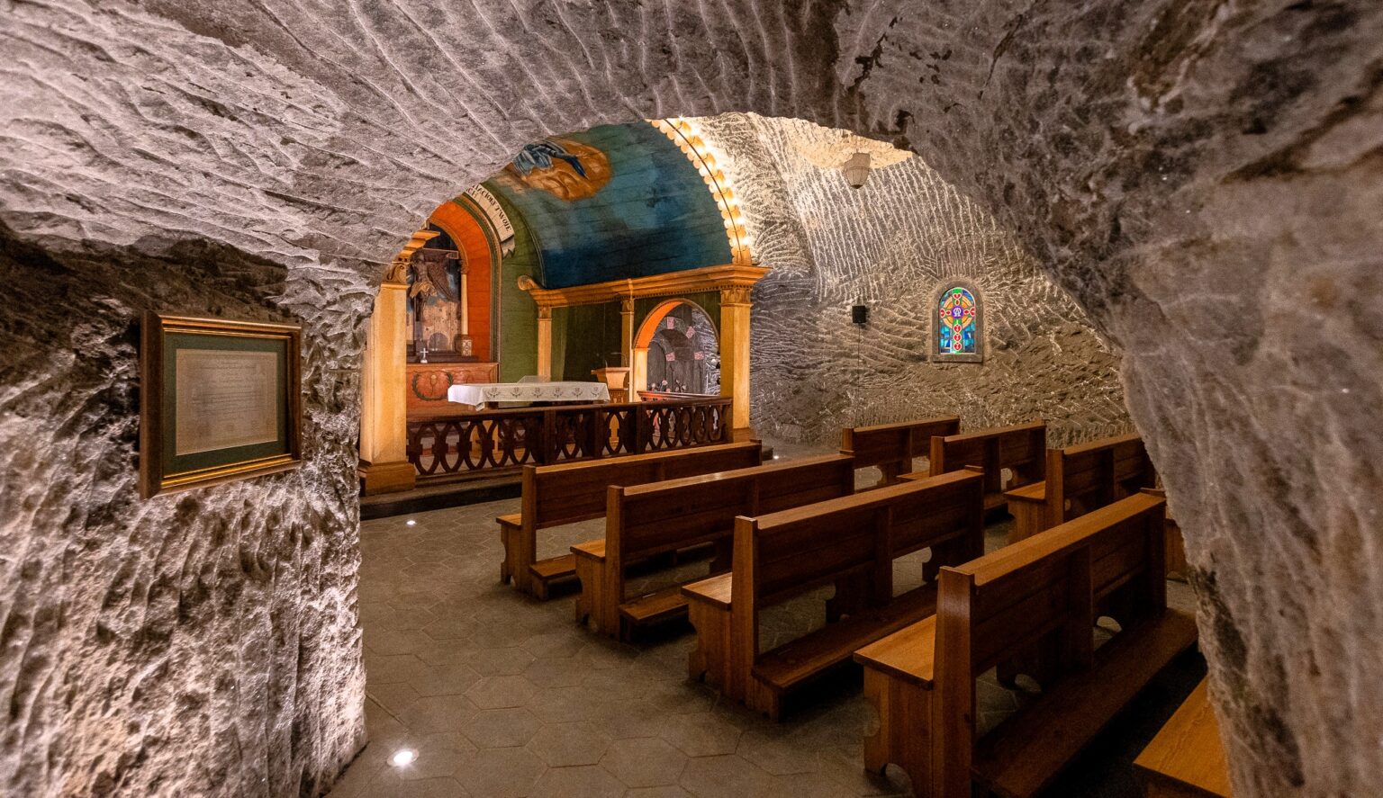 Discover the remarkable St Kinga's Chapel, nestled 101 meters underground in the Wieliczka Salt Mine near Krakow, Poland. This Easter, experience a special service in this awe-inspiring chamber, adorned with intricate salt sculptures and crystal chandeliers.