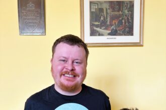 Meet Marcus Ansell, a quirky man with an insatiable love for tinned fish, consuming up to 3 tins daily! His eccentric reviews have gained him quite a following, even catching the eye of major supermarkets. Join him and his dog Arthur as they dive into the world of tinned fish delights!