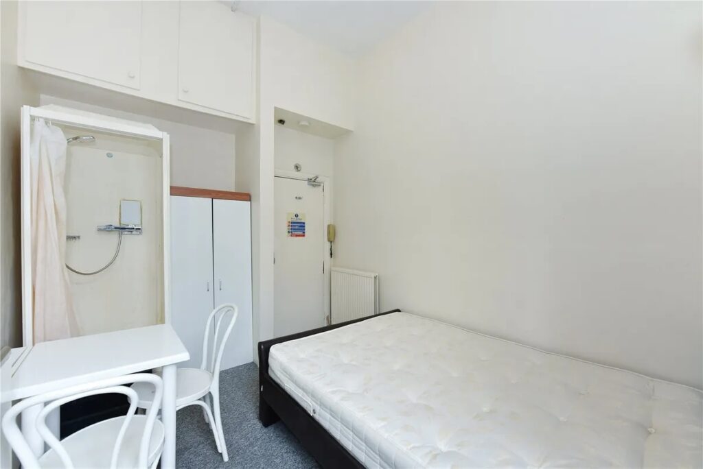 Experience London living in this £1,750 studio in desirable West Kensington, Zone 2. But beware, there's a catch - no toilet! Enjoy showering, cooking, and sleeping in one room, plus a balcony and bills included. Perfect for those seeking central location living.